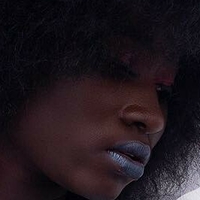 smiley_black_doll Nua